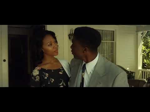 Locker-room moment in the '42' trailer; muted strings and horn theme underline resolve