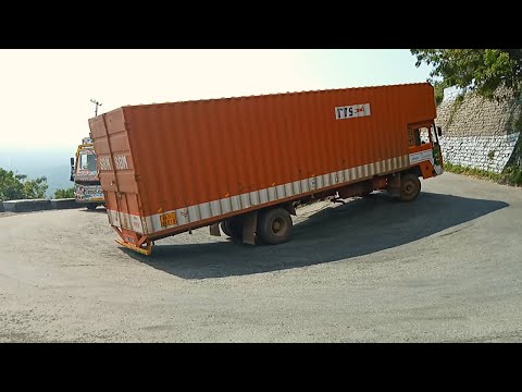 Long Size Container Lorry And Load Lorry Turning Risk Driving Ghat Road
