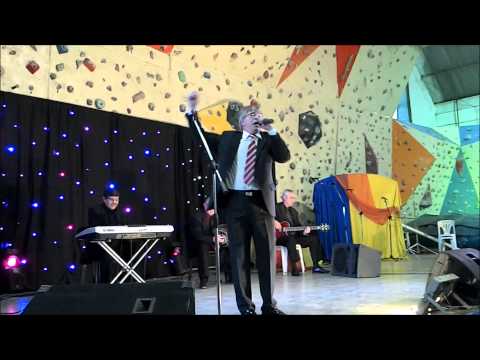 El Maestro Carlos Nieto junto a Dante Garello y la banda