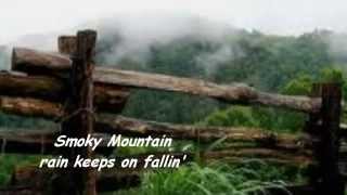 Video thumbnail of "Smoky Mountain Rain - Lyrics - Ronnie Milsap"