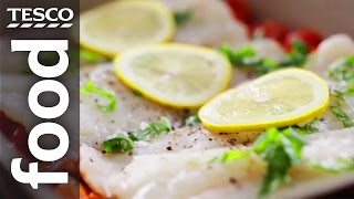 Baked fish with tomato and herbs