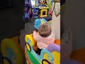 Stella And Ryleigh Riding Merry Go Round At Chuck E Cheese
