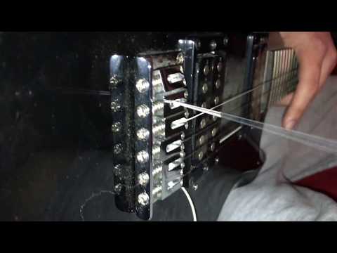 E-Gitarre einsaiten elektrische Gitarre Saiten wechseln Saiten aufziehen Saitenwechsel Anleitung