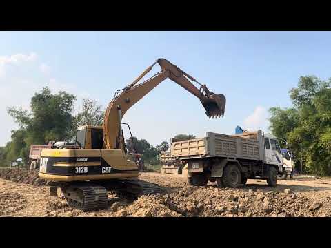 Cat 395 Excavator Loading Trucks With Only Two Passes - Mining 4k