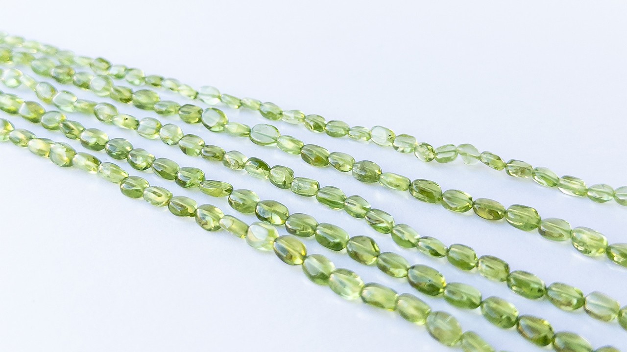 Peridot | Smooth Oval | Various 4-5mm Bead Size | 35cm Strand Length video