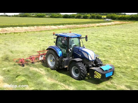 4k Hay Harvest 2023 - New Holland T7.225 Blue Power tedding with a Kuhn GF6301 tedder in Suffolk