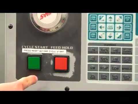 How do you probe the center of a boss in a Haas CNC mill?