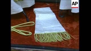 Papal tailor prepares handmade outfits for new pope