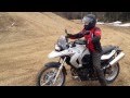 Camille Crimson Riding BMW Motorcycle On A Trail