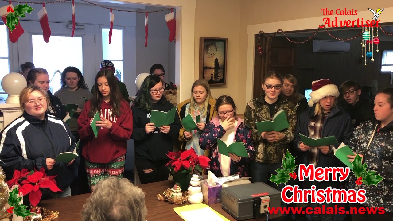 Calais High School Carolers visit to our newspaper's office The