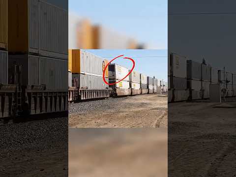 Speeding Intermodal With a leaning Container (looks like its going to tip over)
