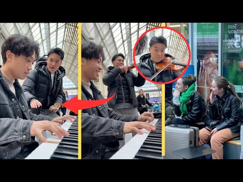 A famous violinist joins me while I am playing in the train station