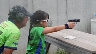 This 10-year-old knows how to use a gun