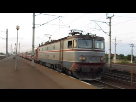 Romania: CFR Railways electric Class 41 loco leaves Buftea on a passenger service to Bucuresti Nord