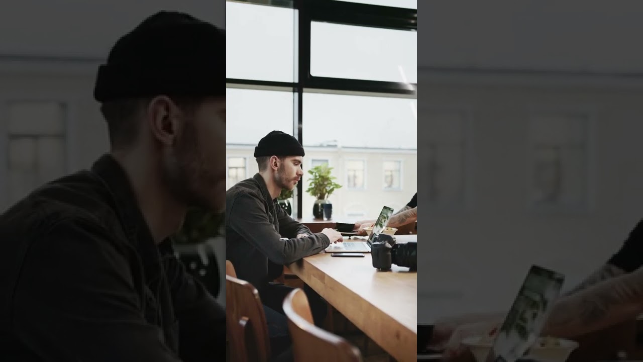 FREE STOCK VIDEO - 4K - Man Working In A Coffee Shop