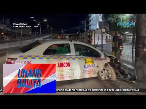 Taxi, bumangga sa traffic sign post at concrete barrier; driver, umaming nakaidlip habang… UB