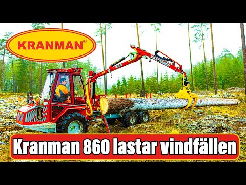 Kranman 860 forwarder picks up blown down trees