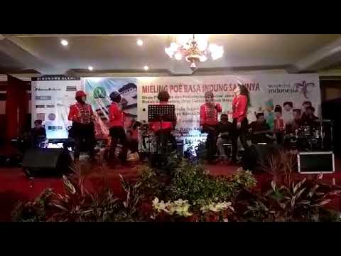 Euis Cahya Dunbar feat Madames Rockers