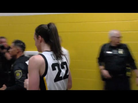 Iowa defeats Holy Cross 91-65