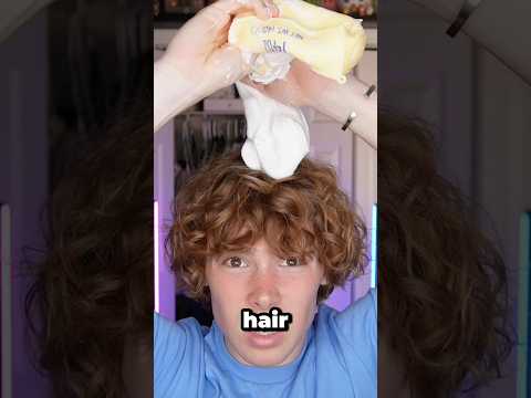 Putting the insides of a butter squishy in my hair