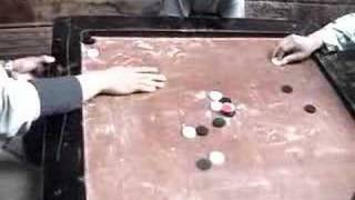 preview picture of video 'Tibetans playing karum / carrom / carom'