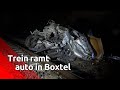 Een auto is woensdagavond laat in Boxtel op een spoorwegovergang terecht gekomen en daarna geramd...