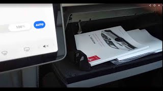 How to open the glovebox on a Tesla Model Y