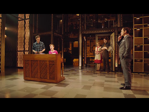 Dim, intimate trailer shot of a solitary piano under a spotlight, suggesting the Tapestry era