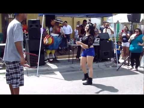 Half Head man Carlos Rodriguez and Girl dancing at Calle 8 2012