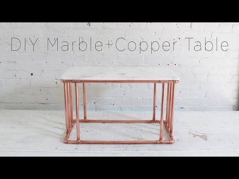 Copper coffee table with a marble top