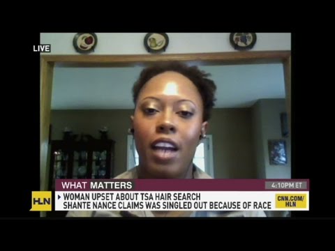 Woman blames airport hair search on race