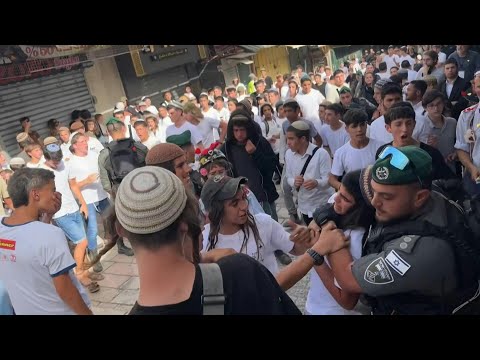 Scuffles with police as Israelis celebrate Jerusalem Day under shadow of Gaza war | AFP