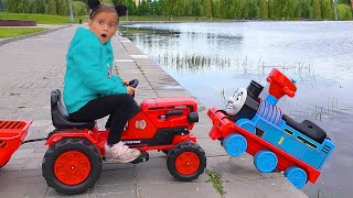 Download lagu Sofia on toy Tractor Saves the Little Bus on Children's park mp3