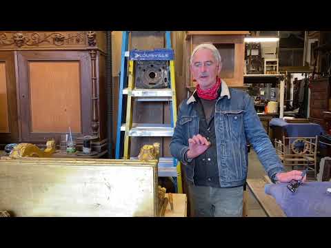 Kipper Burnishes The Gold Leaf with an Agate Stone