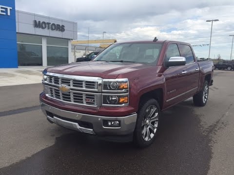 Deep Ruby Metallic 2015 Chevrolet Silverado Z71 1500 4WD LT Truck at Scougall Motors