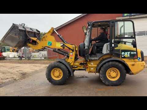 Video: Caterpillar 907H2 gummihjulslæsser 1