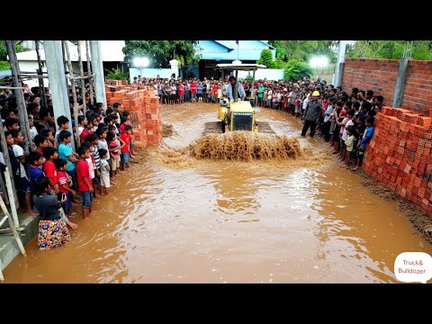 Complete Construction Road By Skill Bulldozer Pushing And 5 Ton Dump Truck Unloading Red Pebbles