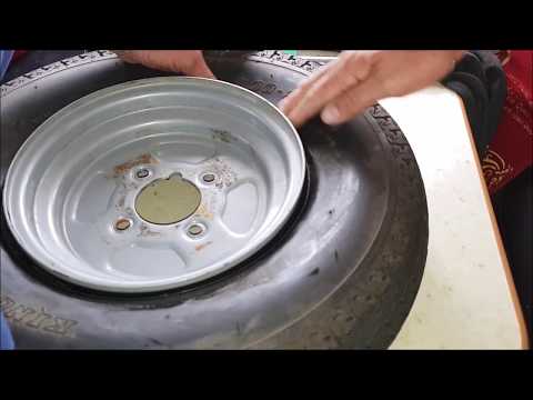 HOW TO FIT A INNER TUBE INTO A TUBELESS TRAILER TYRE BY HAND