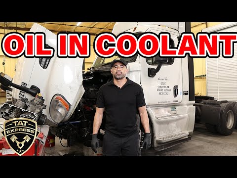 oil in coolant reservoir/ oil in coolant reservoir diesel engine/ oil in coolant reservoir dd15/dd13