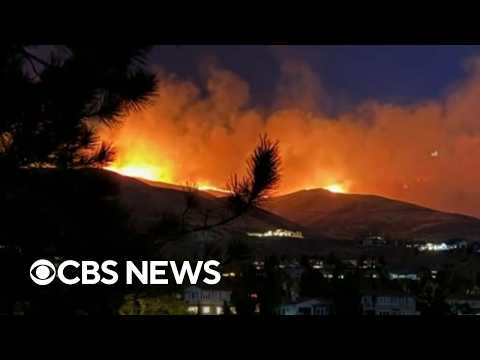 Fast-moving wildfire closes in on Reno, Nevada, forces evacuations