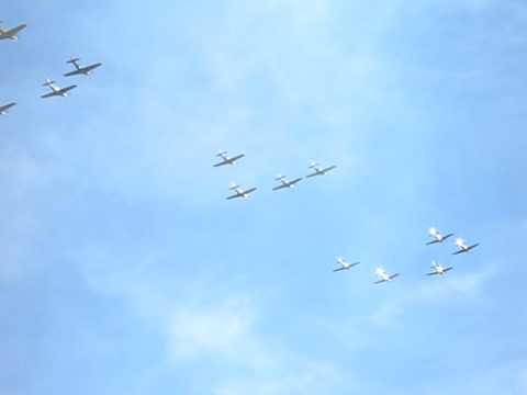 Mass P-51 formation flyby at the Gathering of Mustangs