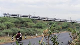 Vande Bharat Express hurries north by the highway.