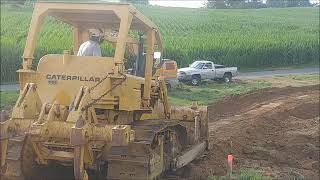 Cat D6C stripping topsoil