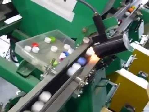 The automatic sorting of the used PET bottle caps, in detail