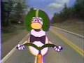 Barney On A Bike