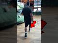 NORE SHOWS HIS DIGITAL SNEAKERS....