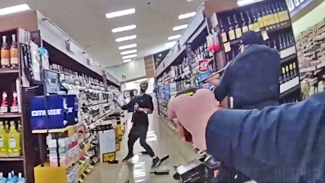 Officers Shoot Knife-Wielding Suspect After He Throws Wine Bottles At Them