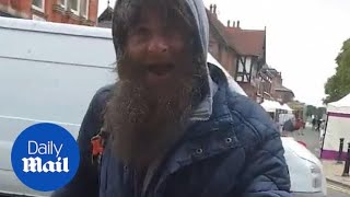 Man confronts professional beggar who later admits