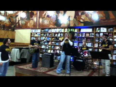 Members of the Trez Rock Shop Gig at Midtown Scholar