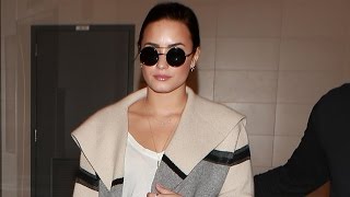 Demi Lovato In Cute Sweater Departing At LAX